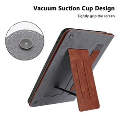 Tablet case with brown stand and gray back, featuring a vacuum suction cup design.